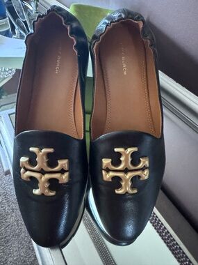 Tory Burch Black Leather Slip-On Flats with Gold Logo Emblem